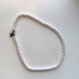 new, unworn pearl necklace